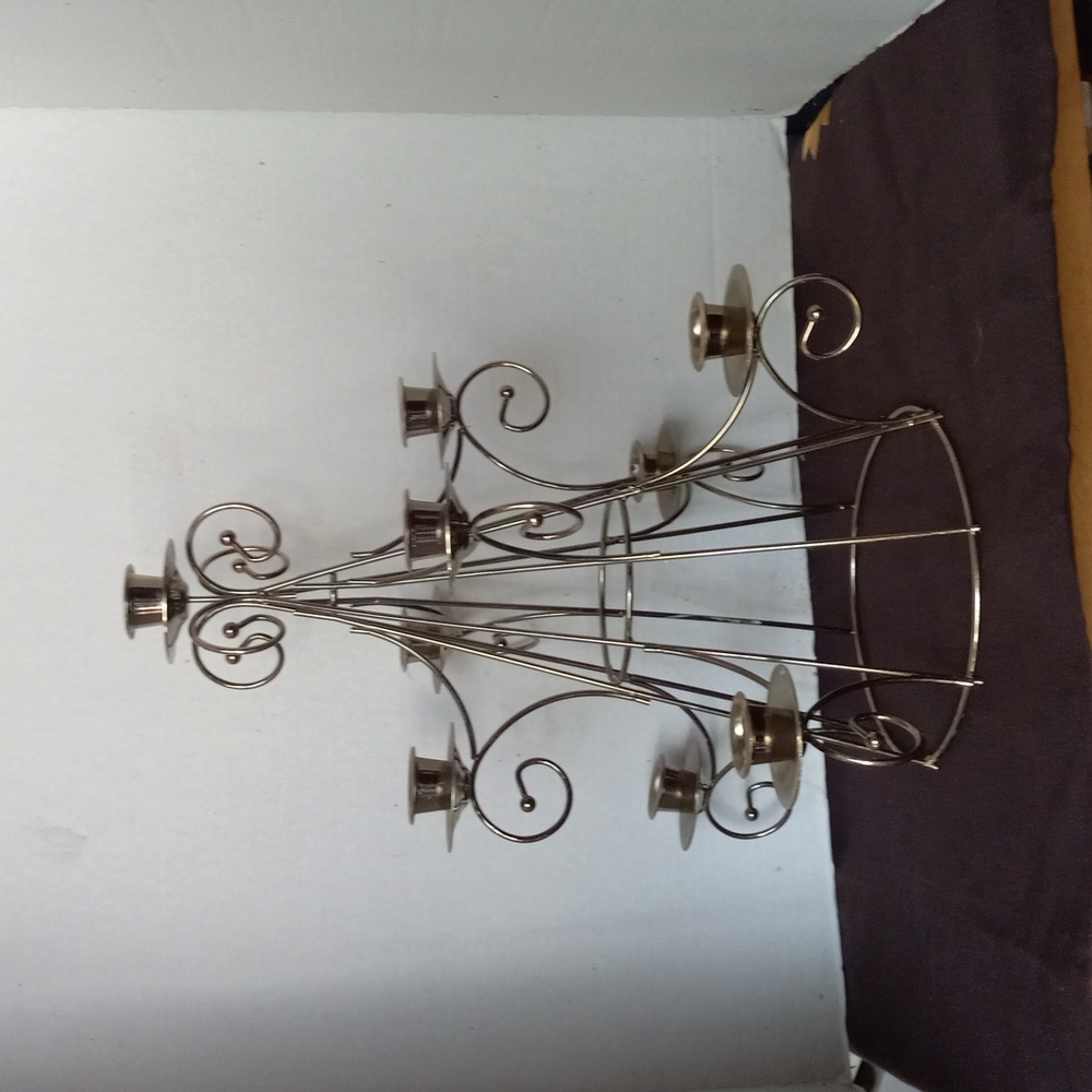 Brass tone multi candle stick Xmas tree.